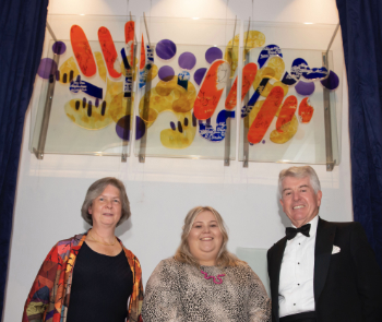 Award founder Valerie Seager, glass artist Bethan Yates, and Chairman of the Board of the English National Opera, Harry Brunjes