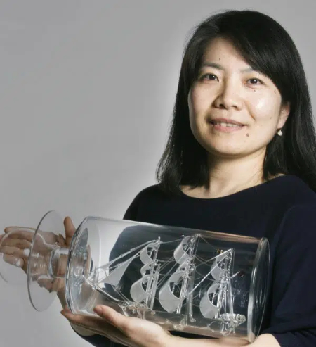 Ayako Tani with glass ship in bottle