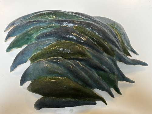 Textured glass sculpture called Flow