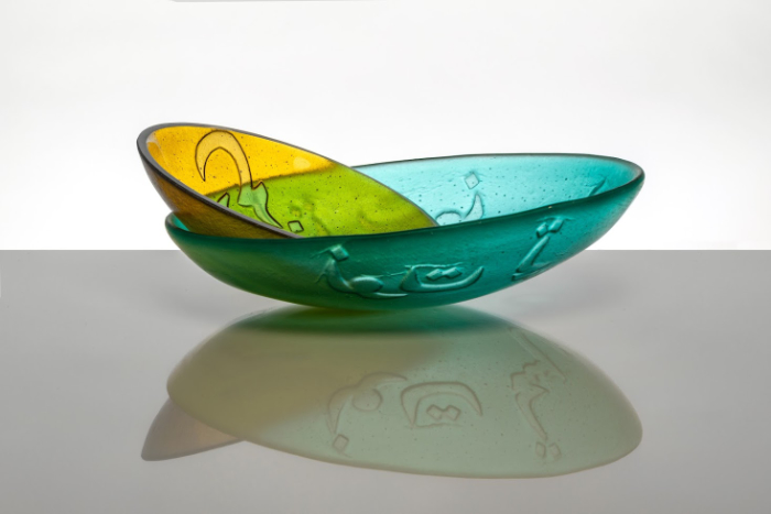 Two balancing glass bowls exploring the notion of in-between-ness