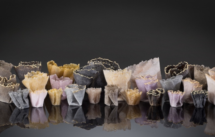 Collection of glass vessels finished with gold leaf by Tali Grinshpan called Sanctuary.