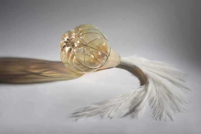 Blown glass and mixed media piece called Dream Seed I.