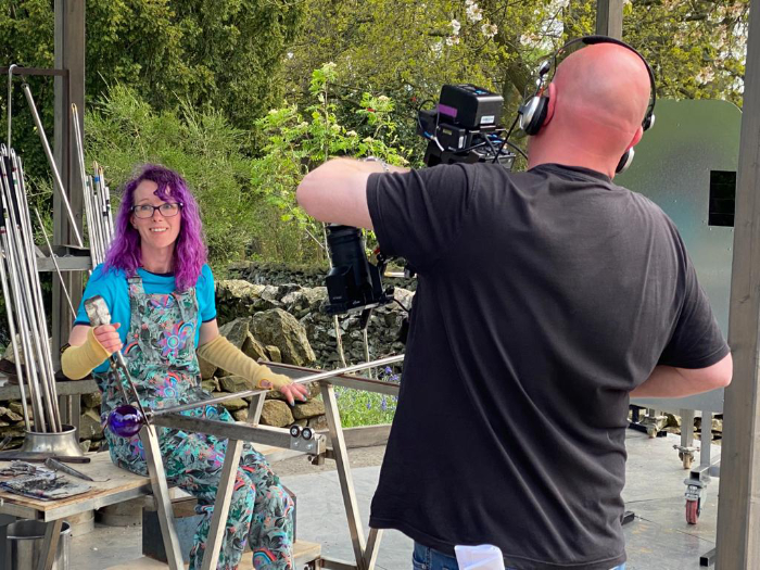Emmy Palmer glassblowing and being filmed for the tv series Make It At Market.