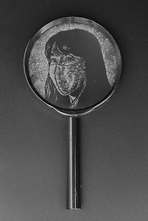 Etched glass portrait of Eriko Kanda wearing a face mask, mounted in a looking glass by Dominic Fonde.