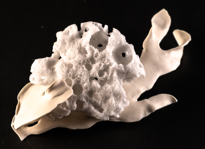 Deep Unknowns 2 - carved foam glass and porcelain sculpture by Maria Donnai.