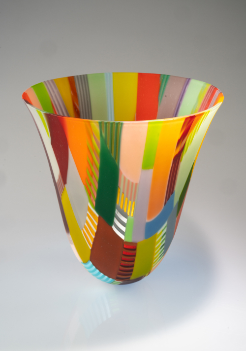 Cynefin vessel in a patchwork of bright colours.