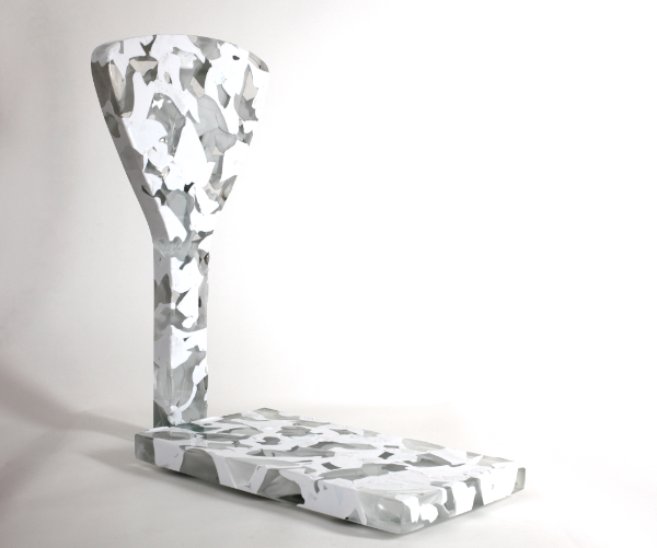 Cast glass sculpture in grey and whites in shape of weighing scales, titled 'Meltdown'.
