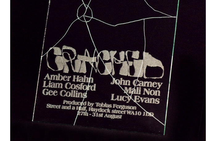 Detail of etched poster for CRACKED exhibition.