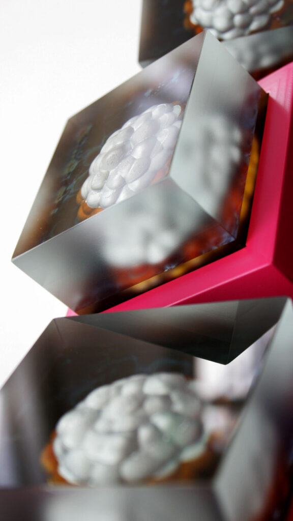 Another detail of Urban Echoes showing the glass pieces and their inclusions close up.