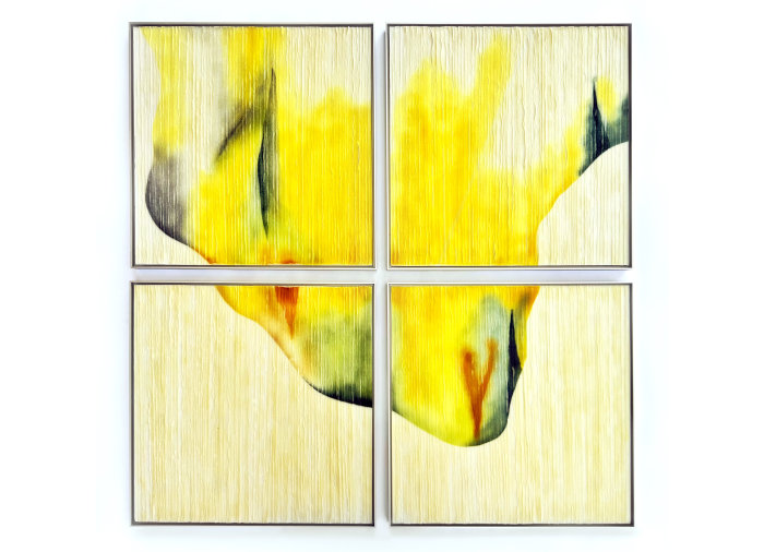 Four square wall art panels set close together to form a large square and made from textured cast glass in tones of yellow, brown and red called Botanical Field.